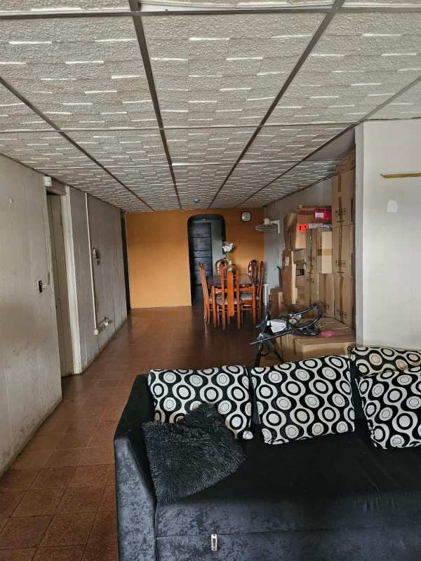 Open plan living dining area with tiled floors, sofa, dining set PH Bello Horizonte Panama