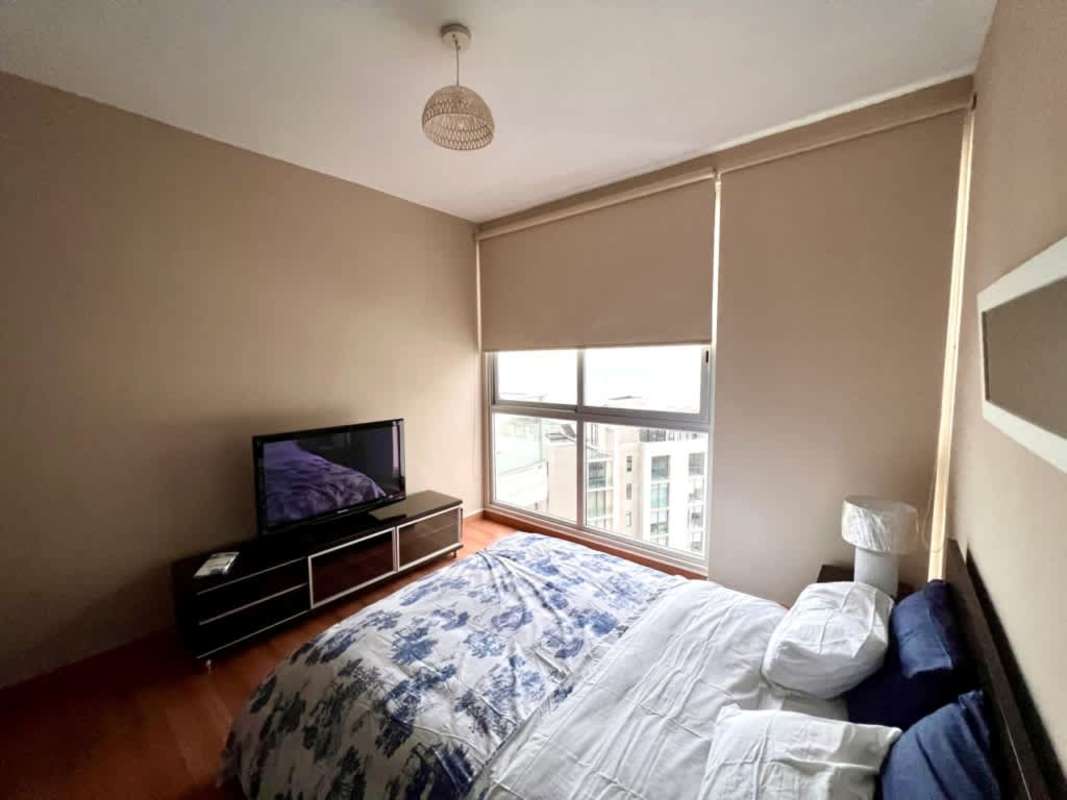 Bedroom minimalist design with ocean view window at PH Ocean Club Panama City