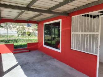 Covered patio with window steel gates fence in Santa Rosa Chilibre commercial property for sale