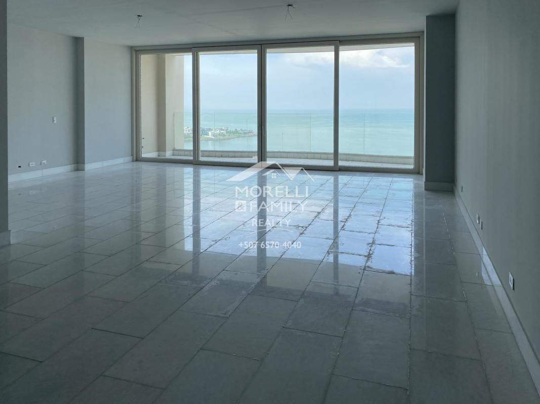 Modern living area with marble floors and stunning ocean panorama at The Towers Punta Paitilla Panama