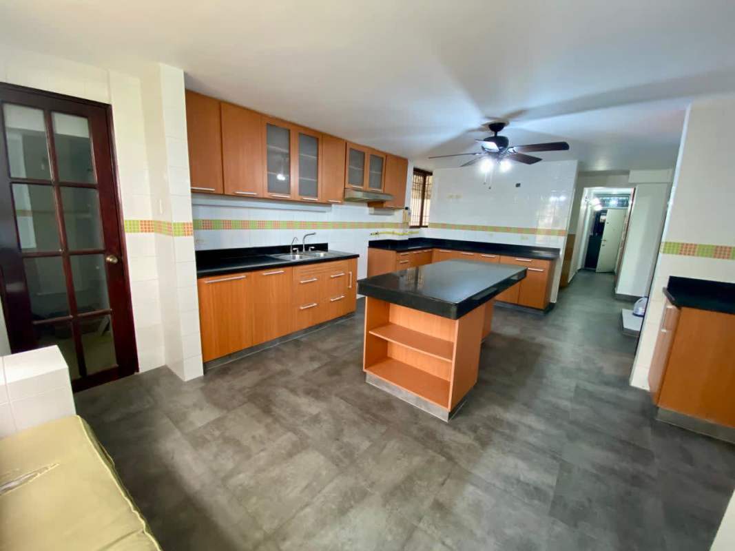 Spacious formal dining area with marble floors and elegant lighting in PH Sobre Las Rocas Coco del Mar Panama