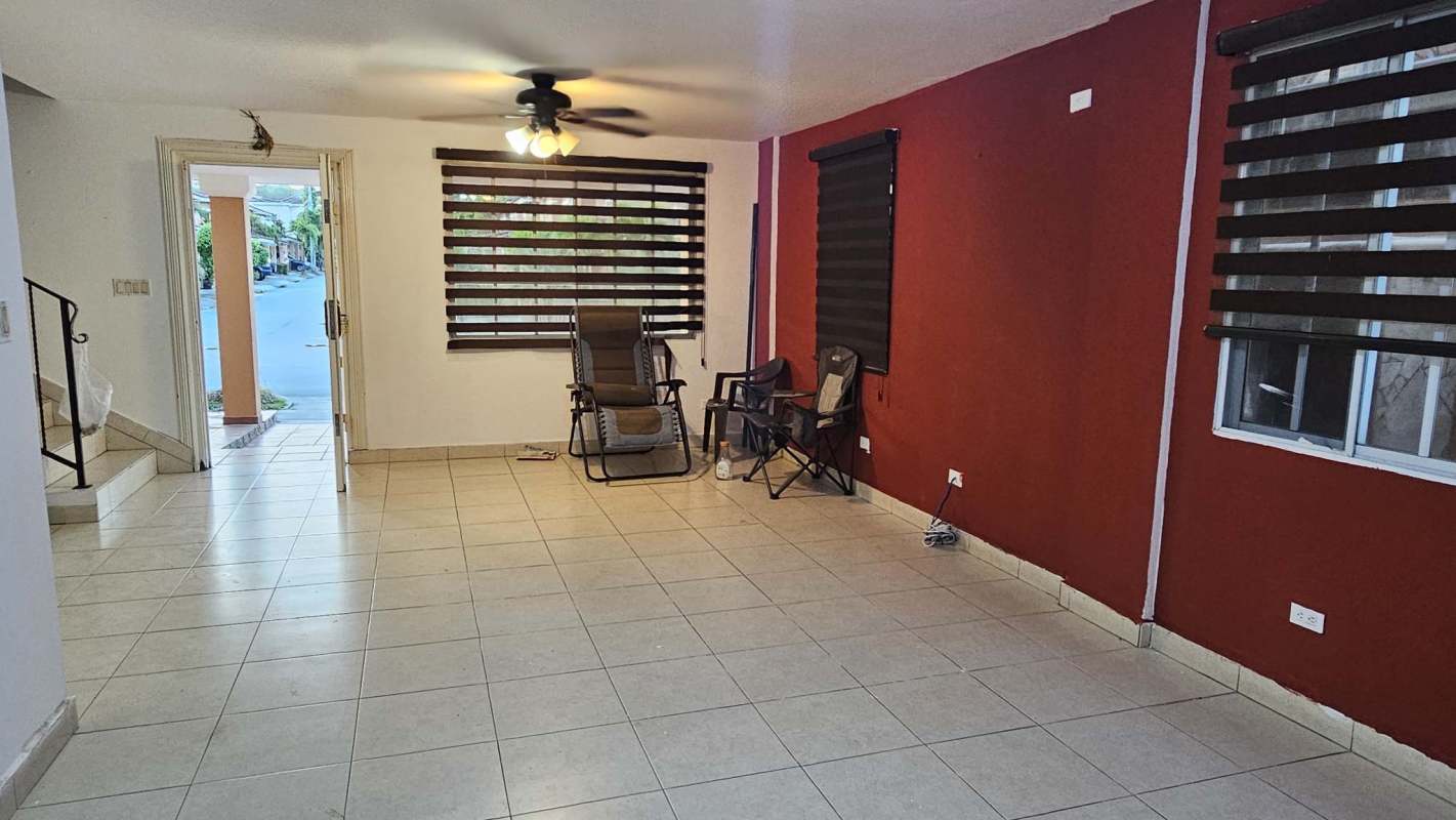 Living room large tiled floor sliding door ceiling fan Dorado Lakes Panama