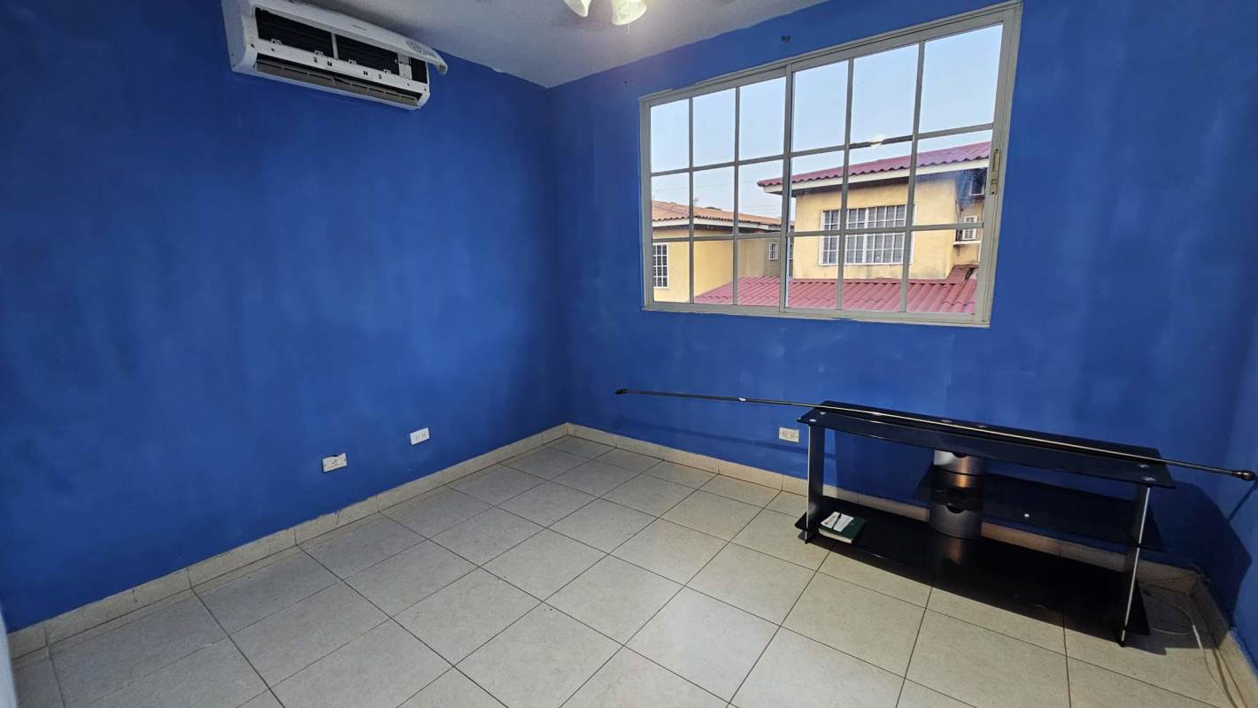 Small enclosed patio courtyard potted plants sliding door Dorado Lakes