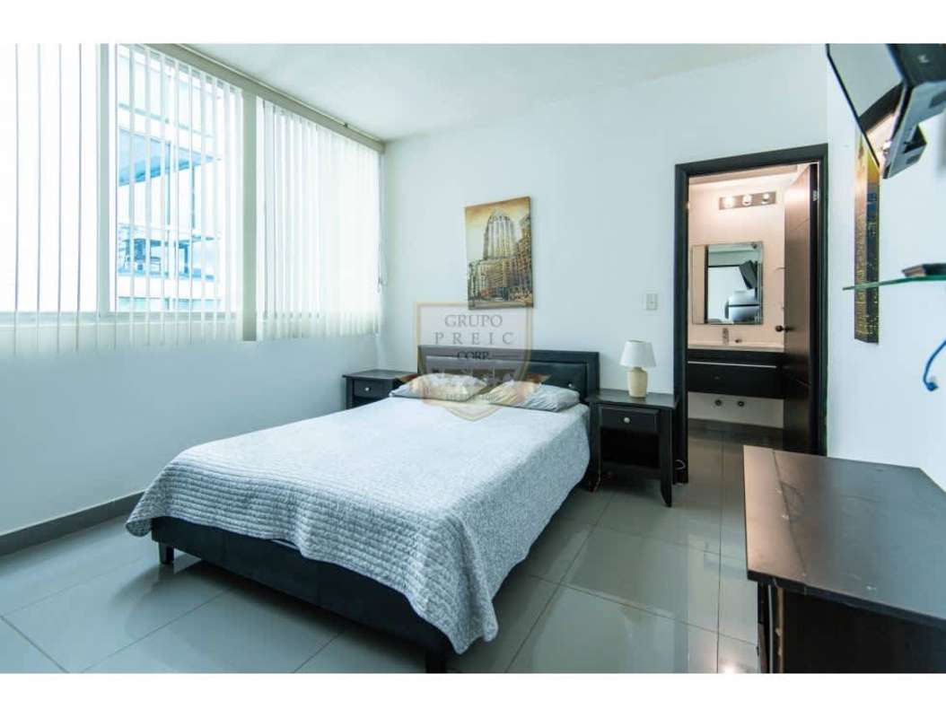 Bedroom with split AC, large window, built-in closet at PH Quartier San Francisco