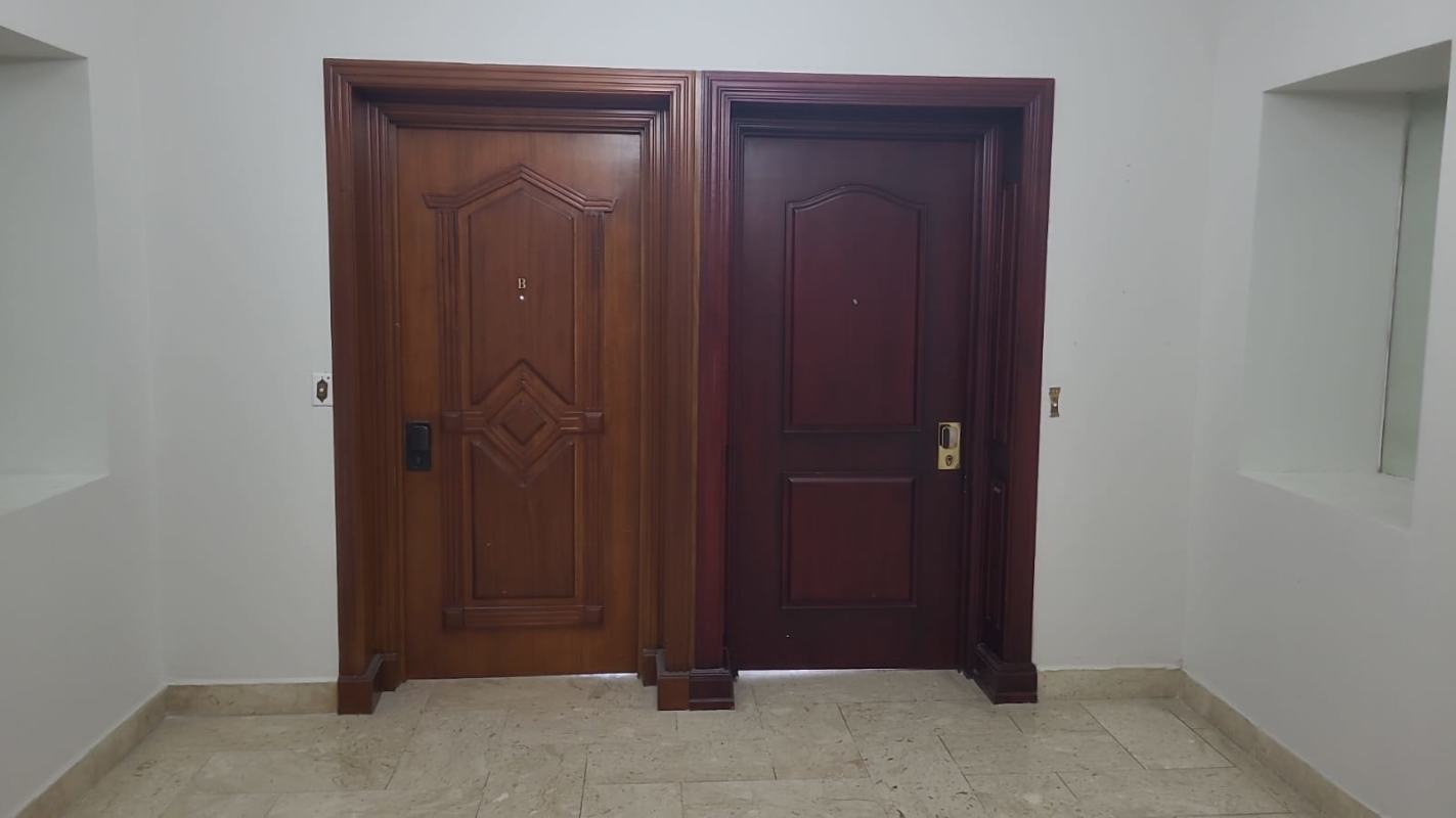 Modern bathroom with walk-in shower, vanity and designer tile at Cresta Palace in Bella Vista Panama