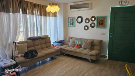 Modern living room with large windows, AC, wooden floor, access to private balcony in Punta Chame Panama