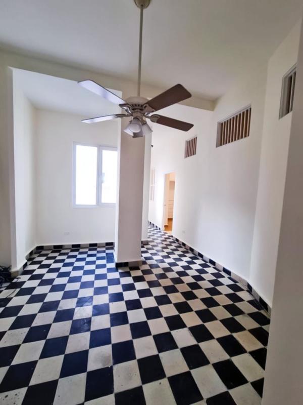 Open concept living-dining with wooden ceilings and artisan details Casco Viejo apartment