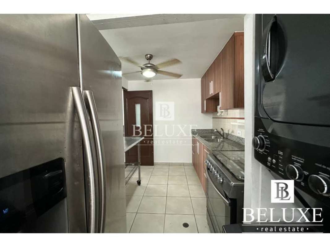 Modern kitchen with granite countertops stove fridge PH Torres Mar del Sur Panama