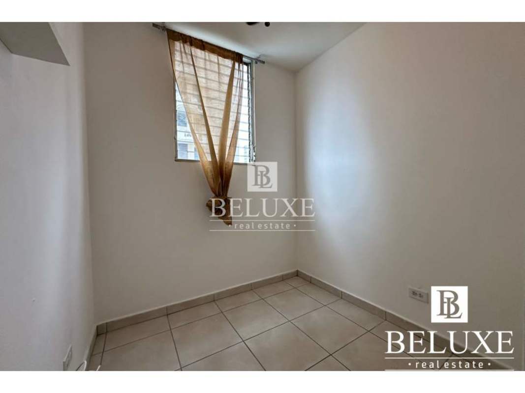 Dining area with glass table neutral decor PH Torres Mar del Sur Panama