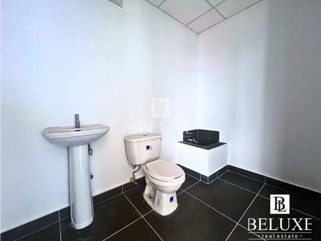 Commercial office bathroom with ceramic floor and fixtures PH SFC Tower Obarrio Panama