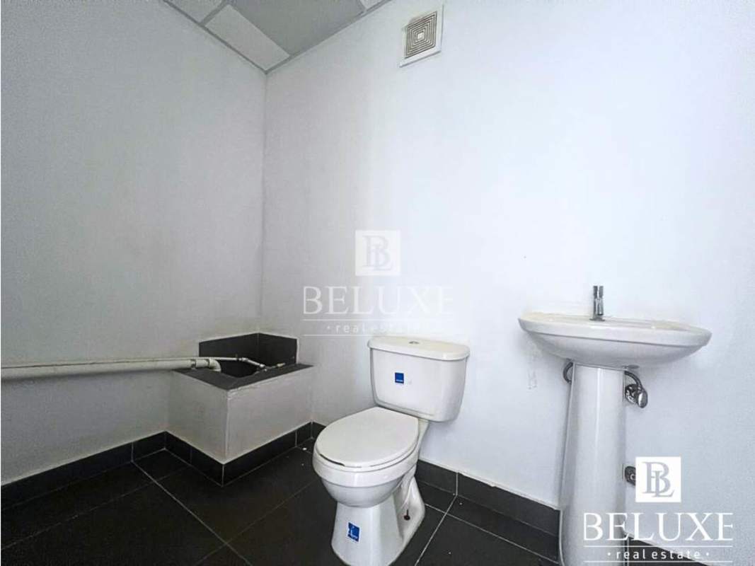 Minimalist commercial office bathroom with pedestal sink and tiling PH SFC Tower Obarrio Panama