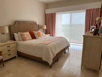 Bright guest suite with sliding doors to terrace coastal luxury penthouse Buenaventura