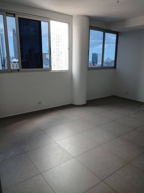 Bright living room with panoramic windows and skyline view in Signature Point La Cresta Panama City
