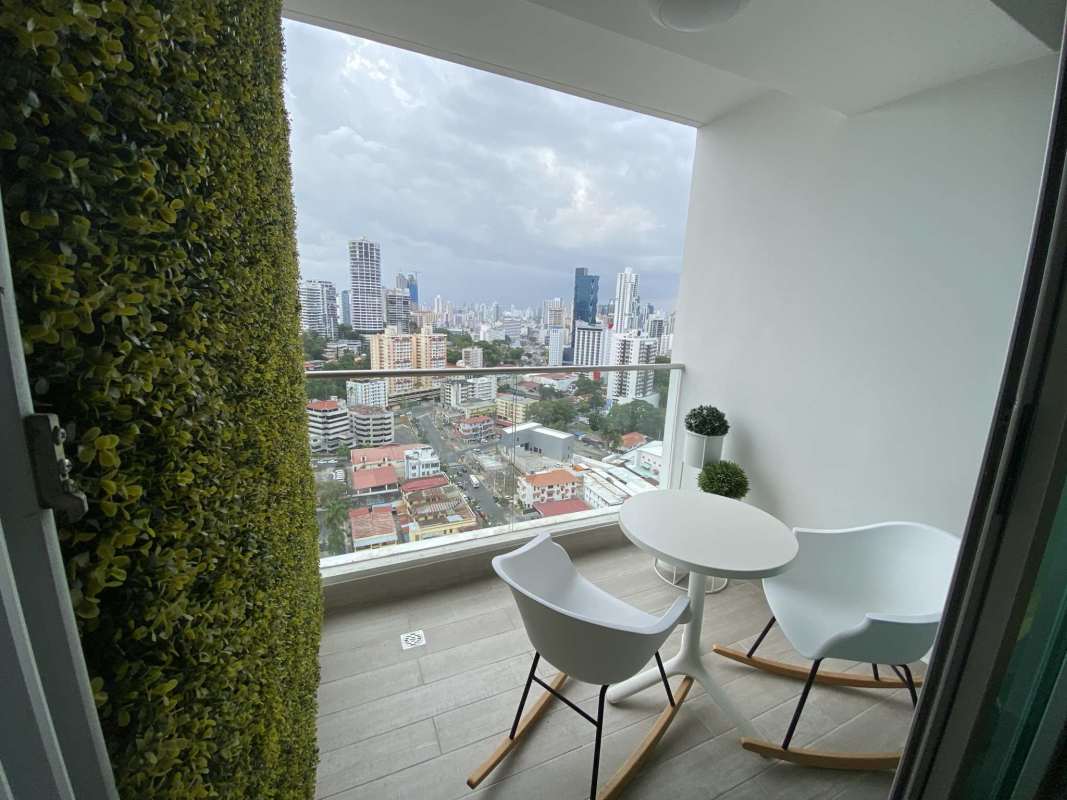 Balcony with skyline view, glass railing and urban feel in PH Altamira Panama City