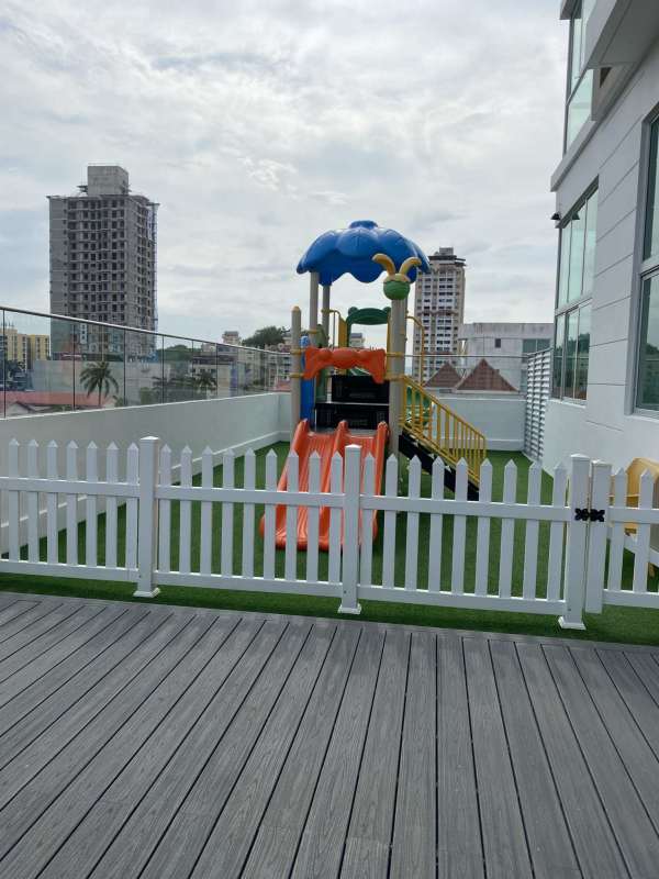 Children's playground with artificial grass and colorful slides PH Altamira Bella Vista Panama