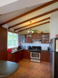 Landscaped green garden backyard Playa Blanca Panama house for sale