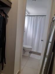 Minimalist bathroom with closet space PH Ciudad del Futuro Arraiján Panama