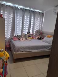 Bedroom with split AC, closet and ceramic floors in PH Ciudad del Futuro Panama