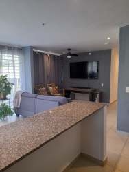 Modern kitchen with granite countertops and appliances in PH Ciudad del Futuro Nuevo Arraiján Panama