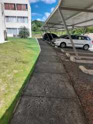 Modern apartment complex with parking and landscaped areas in Nuevo Arraiján Panama