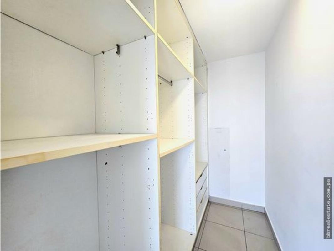 Spacious kitchen with central island, granite countertops at PH The Regent Panama City