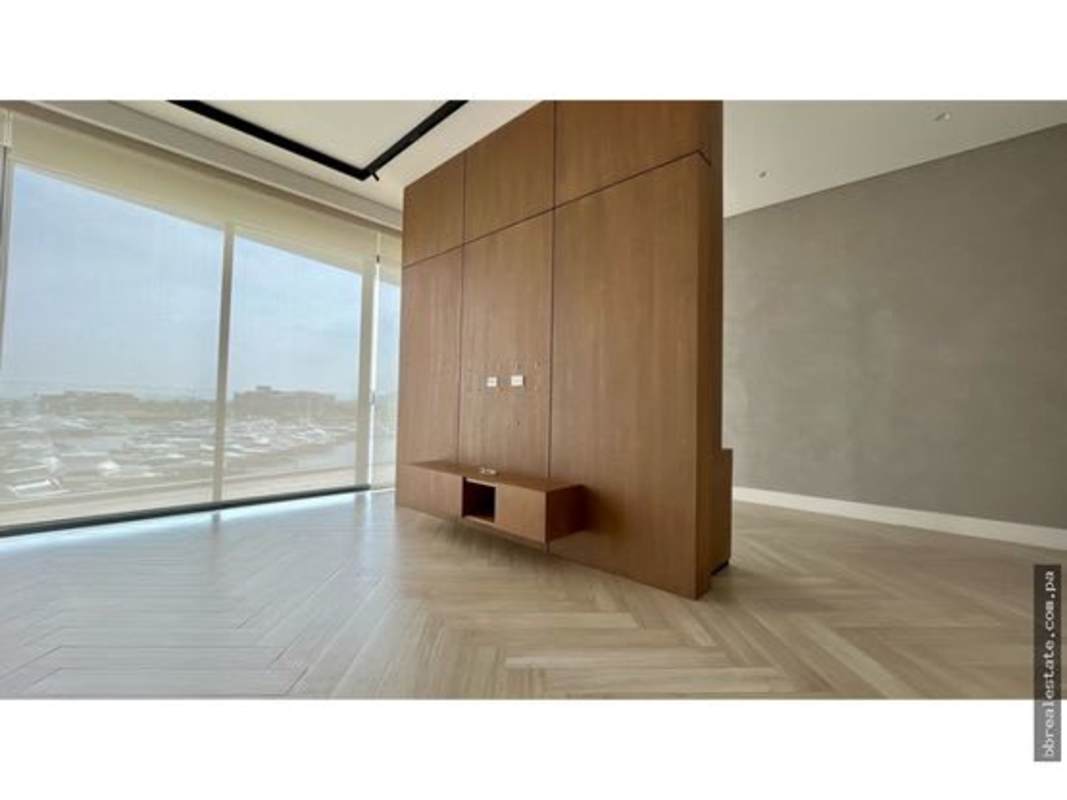 Luxury bathroom with marble tile, double sinks and modern glass shower Ocean Reef Islands Panama