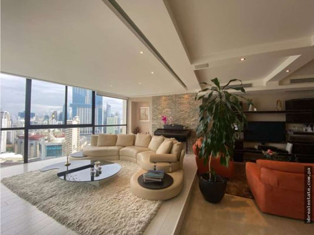 Marble floor dining area with decorative ceiling and large dining set in Golden Palace Tower Panama City