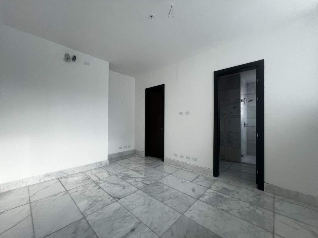 Spacious master bedroom with marble floors and modern finishes Sea Point Tower Panama
