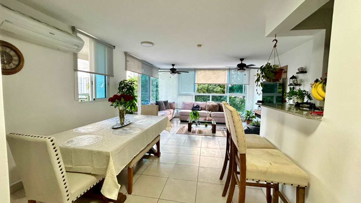 Bright open living and dining area with city view balcony in PH Belview Tower Edison Park Panama City