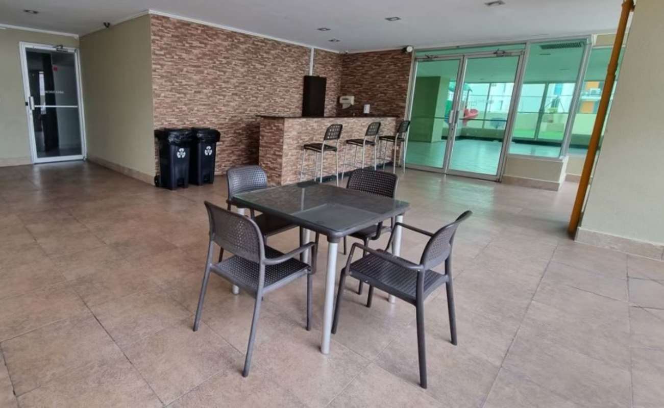 Covered balcony with skyline view at PH Green Bay Costa del Este Panama City