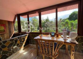 Country kitchen featuring stone walls, stainless appliances and rustic décor Panama