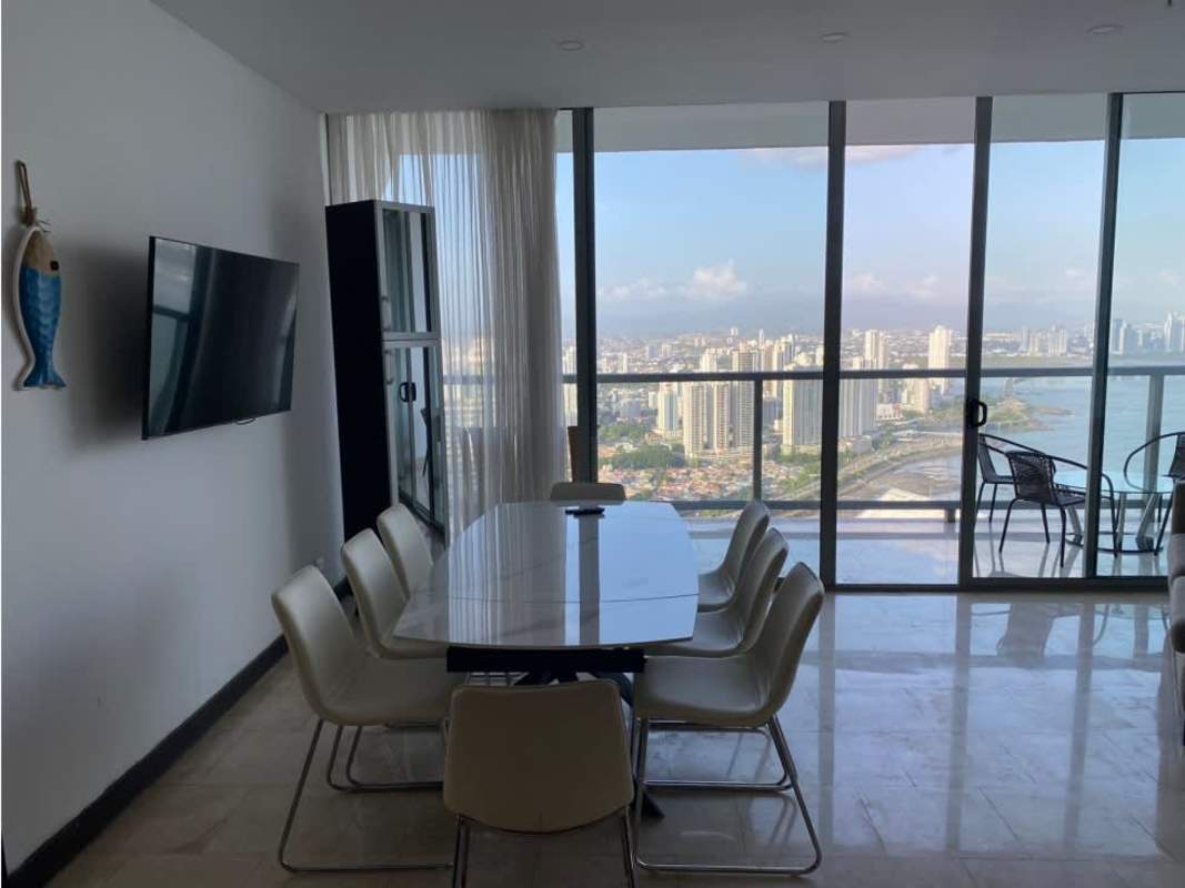 Fully equipped kitchen with granite counters, stainless steel appliances in luxury apartment