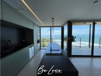 Spacious master bedroom with private balcony and ocean views in Punta Caelo Penthouse Panama