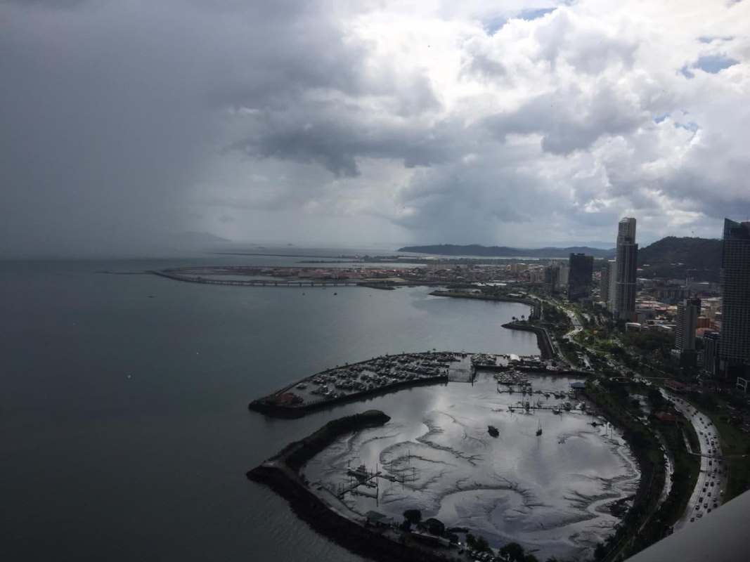 Open dining space with designer kitchen and marble flooring at PH Yoo Panama
