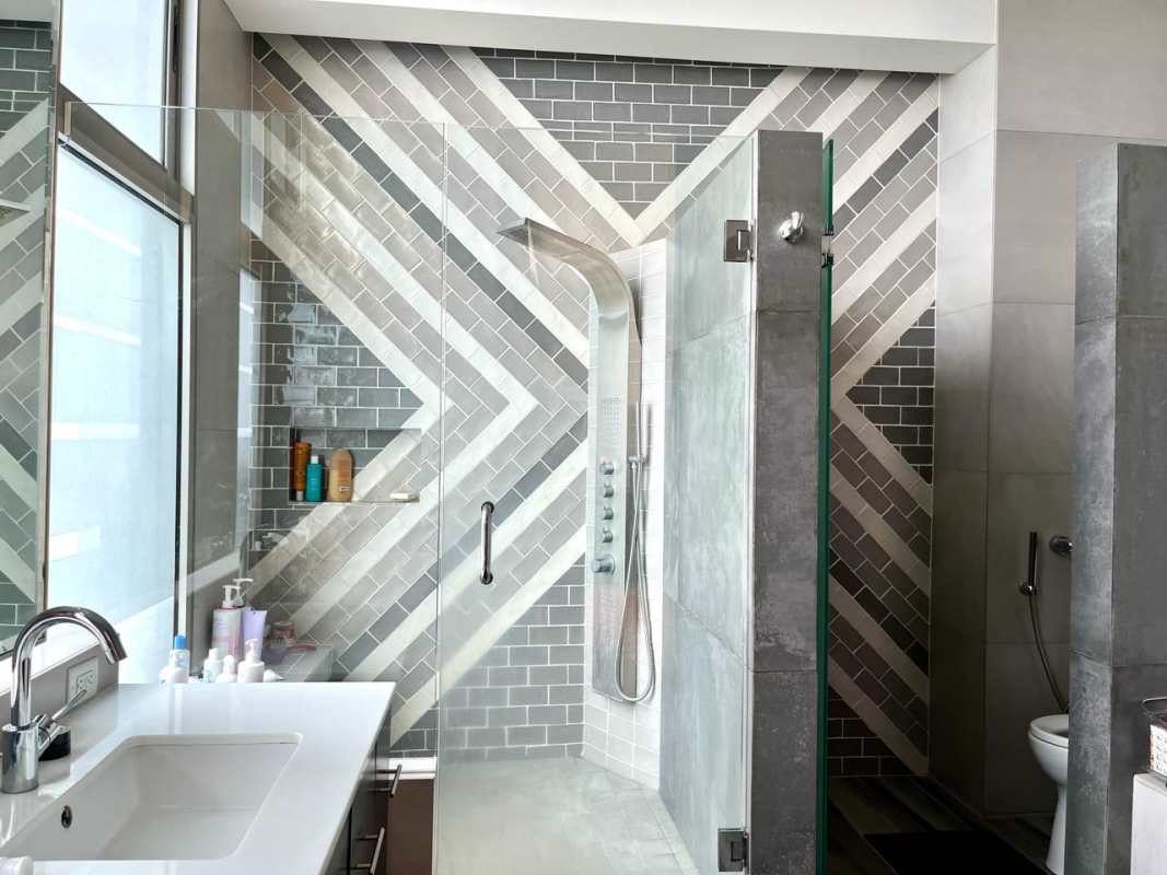 Spacious kitchen with granite countertops and wood cabinets at PH Aqualina Punta Pacifica