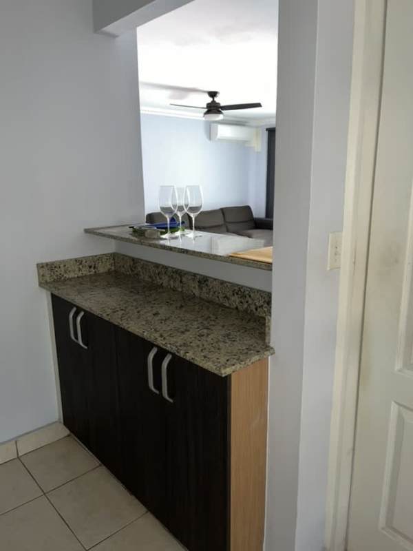 Kitchen with granite countertop, storage cabinets PH Paradise Towers Panama