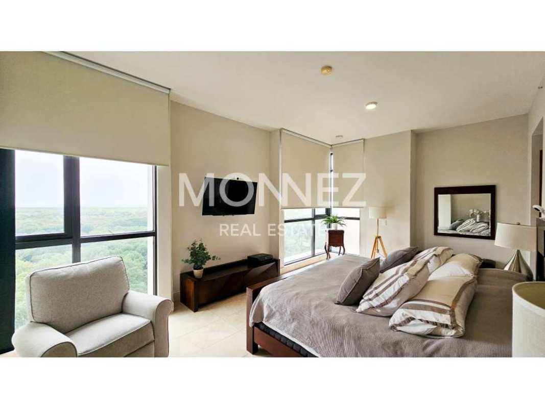 Elegant master bedroom with large windows and golf course view at PH Albatross Panama