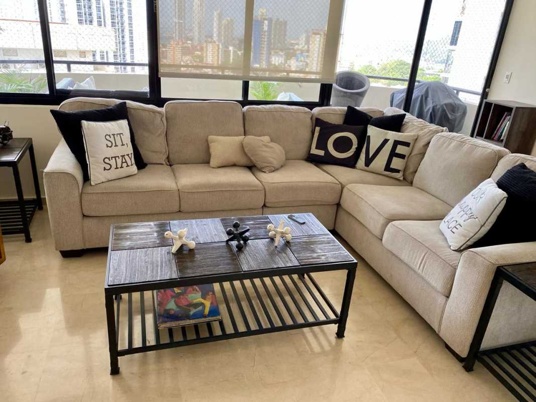 Large living-dining room with marble floors and panoramic windows at PH Edificio Elite Panama