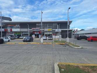 Two story commercial building with retail units and parking Plaza Los Naranjos Penonomé Panama