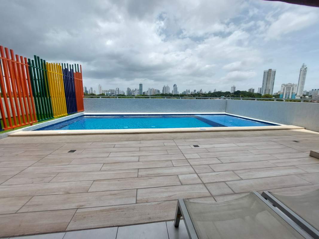 Modern rooftop swimming pool colorful fence city skyline PH Solok Parque Lefevre
