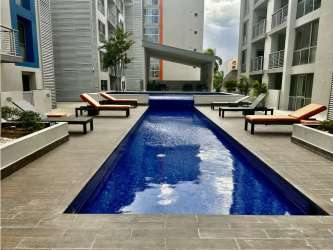 Modern bathroom with glass shower enclosure PH Mosaic apartment Panama Pacifico
