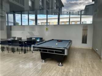 Indoor game lounge with billiards and social space PH Mosaic Panama Pacifico