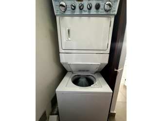 Laundry space with washer dryer setup in PH Mosaic Panama Pacifico