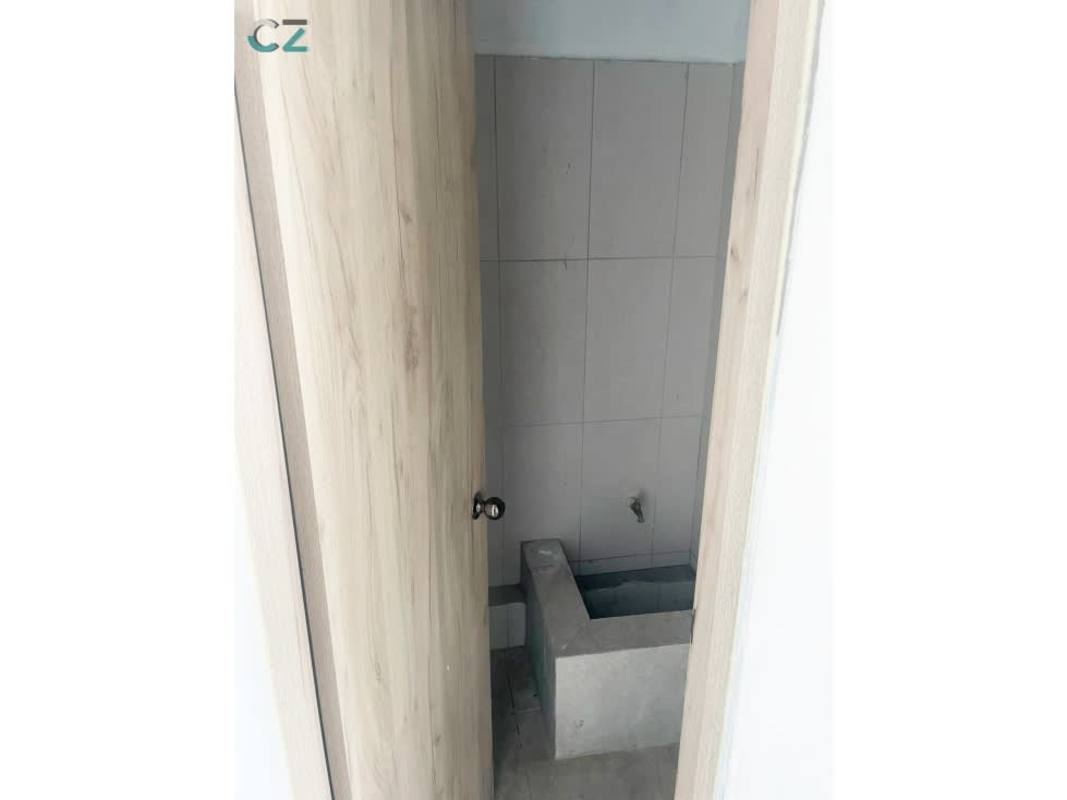Unfinished bathroom with cement basin, partial tiles Midtown Plaza Panama commercial unit