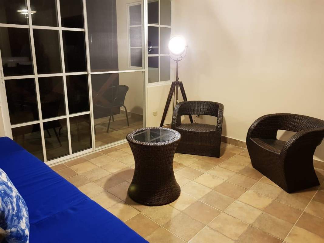 Entrance porch with stone accents and garden seating Cerro Azul Panama