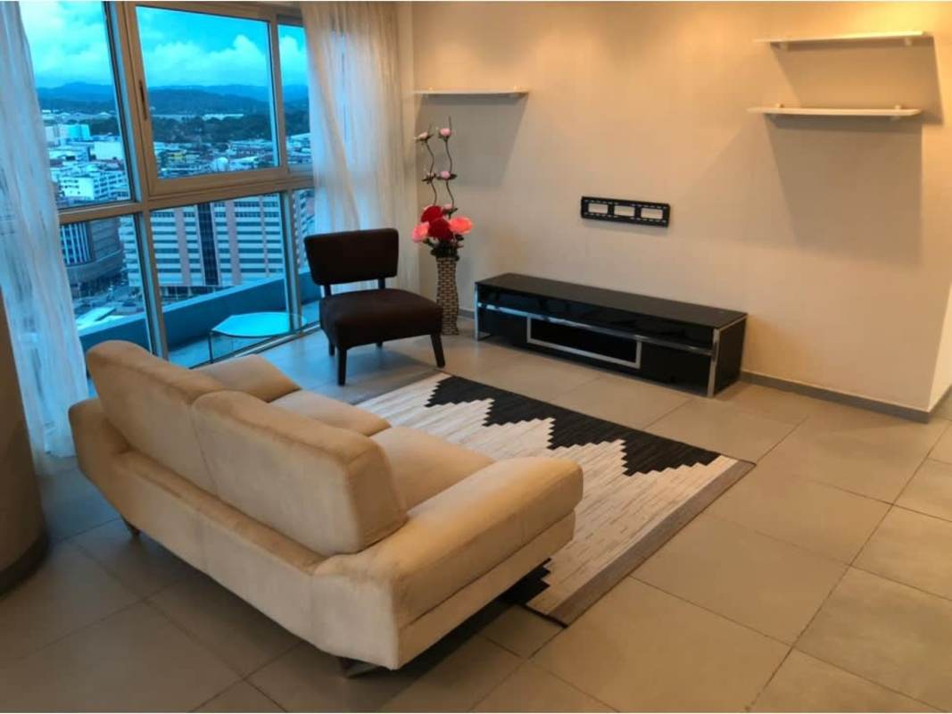 Minimalist living area with skyline view balcony access at PH Yacht Club Panama