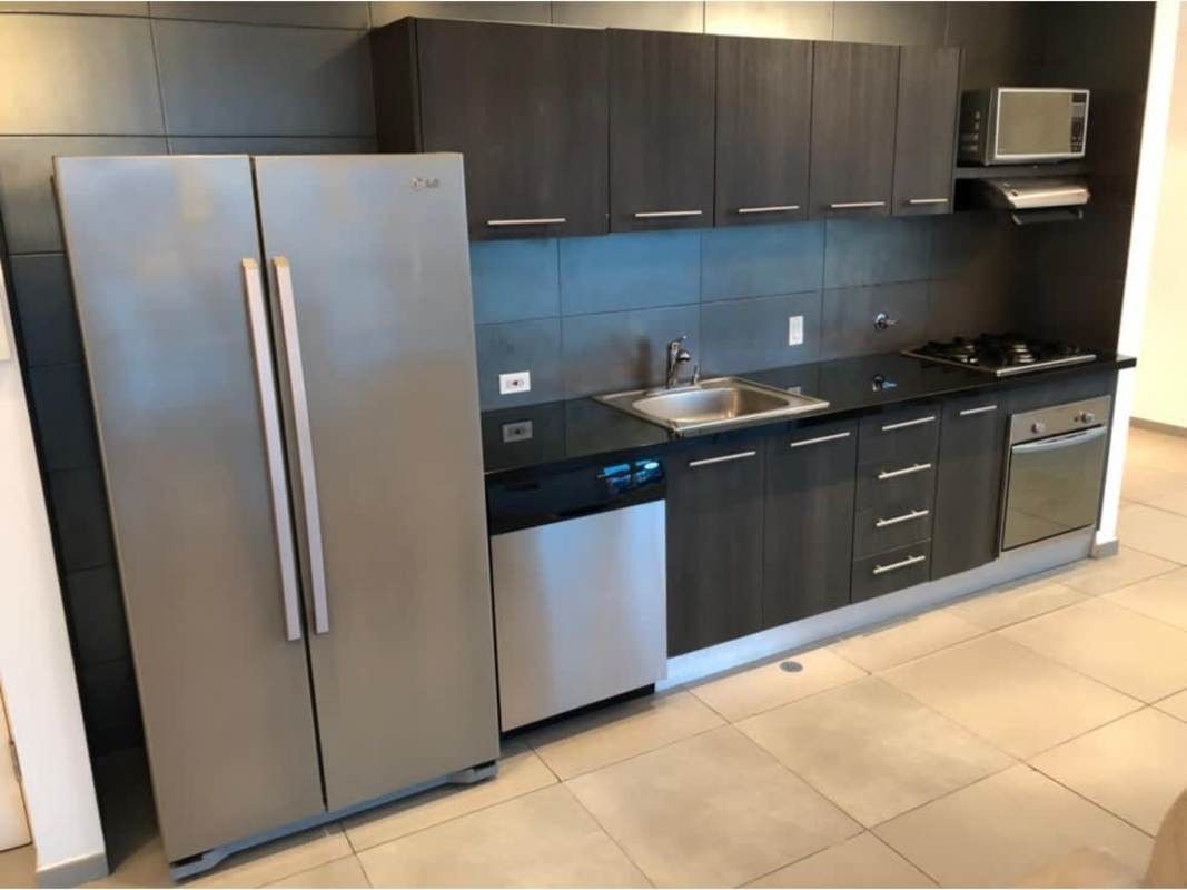 Bedroom with balcony access, city and ocean views in PH Yacht Club Tower Panama City