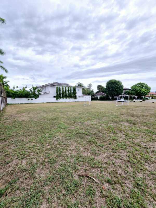 Private green park area with soccer goals surrounded by luxury homes in Veranda Santa María gated community Panama