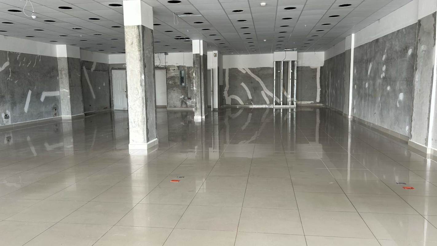Open plan unfinished commercial interior space with tiled floors Tocumen Panama city