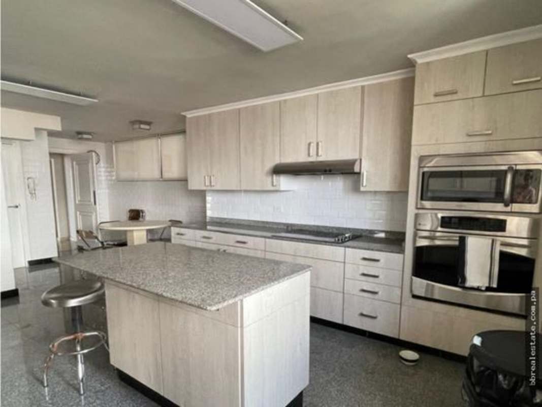Spacious kitchen with granite countertops, stainless appliances in PH Alcazar Panama